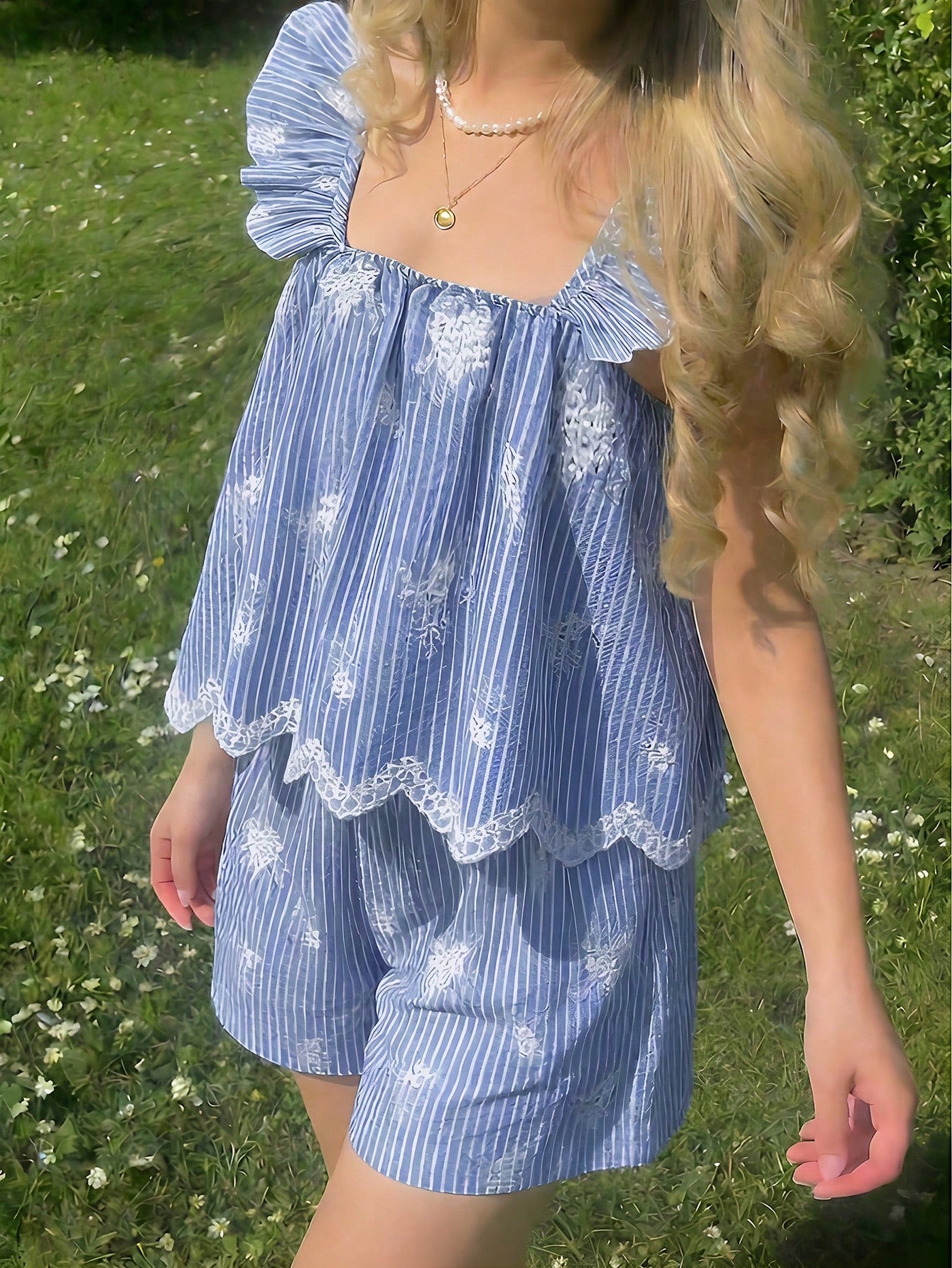 Tween girls 2-piece bohemian outfit set in apricot featuring a square neck embroidered sleeveless camisole top and matching floral wide leg shorts.