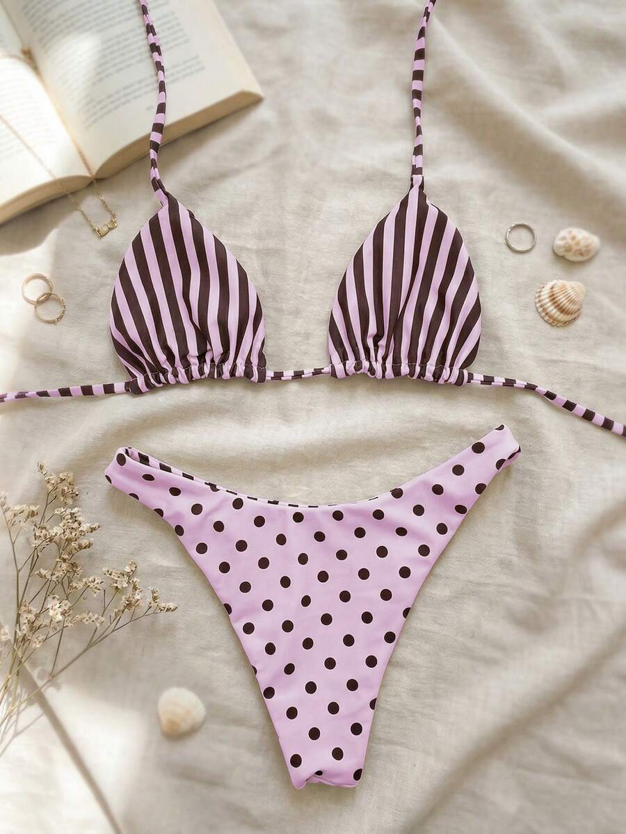 Women's two-piece halter bikini set featuring high cut thong bottoms and removable padding