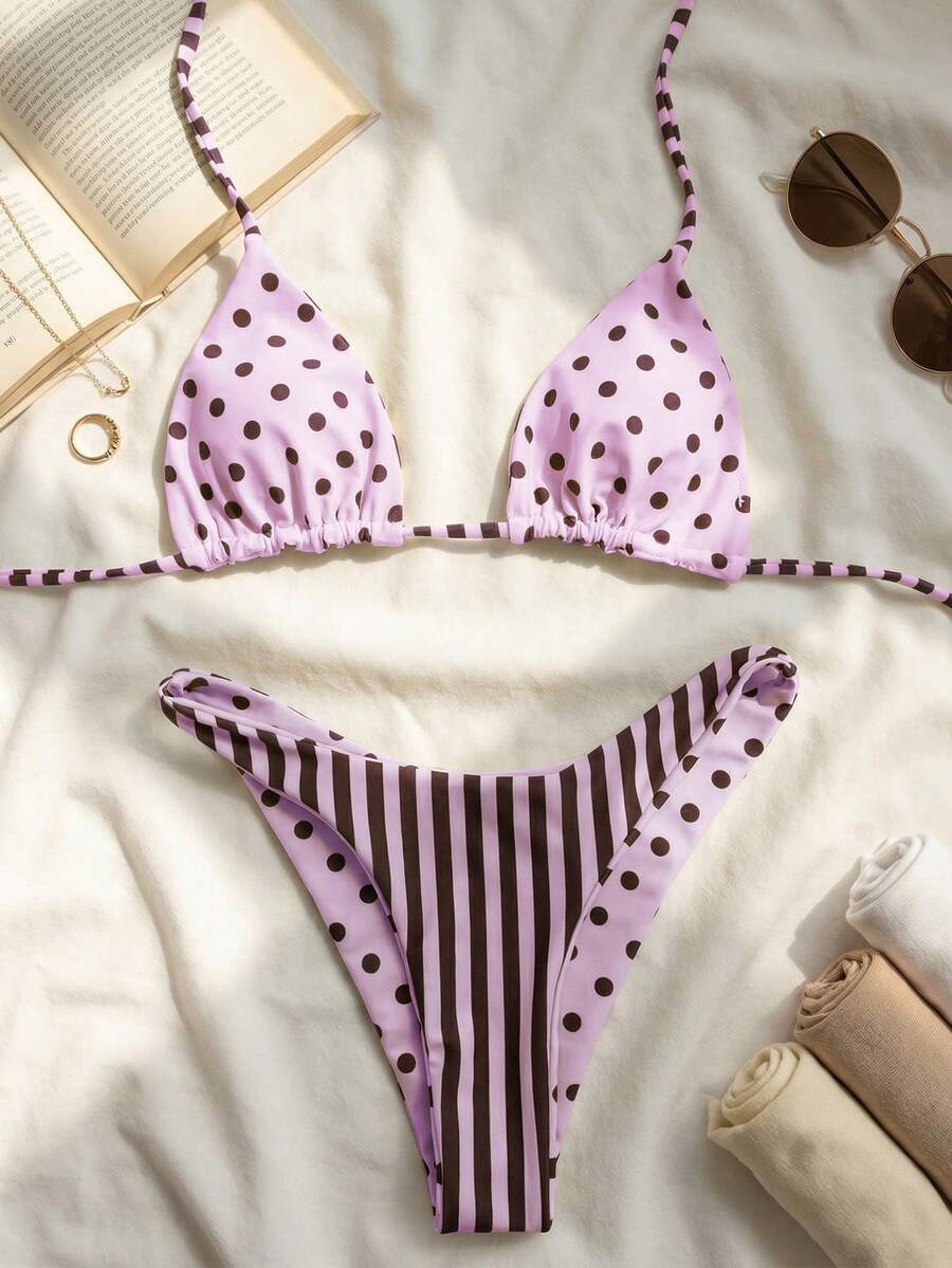 Women's two-piece halter bikini set featuring high cut thong bottoms and removable padding