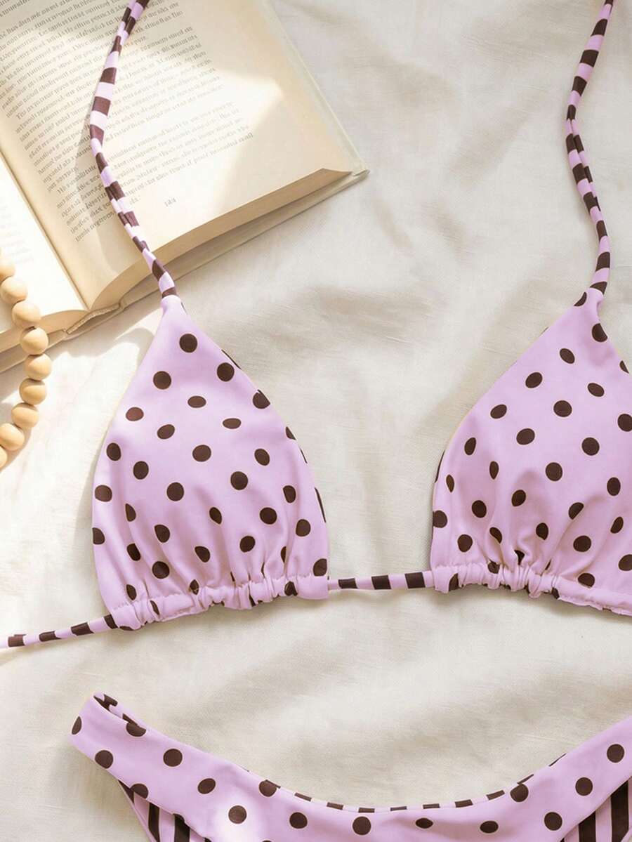 Women's two-piece halter bikini set featuring high cut thong bottoms and removable padding
