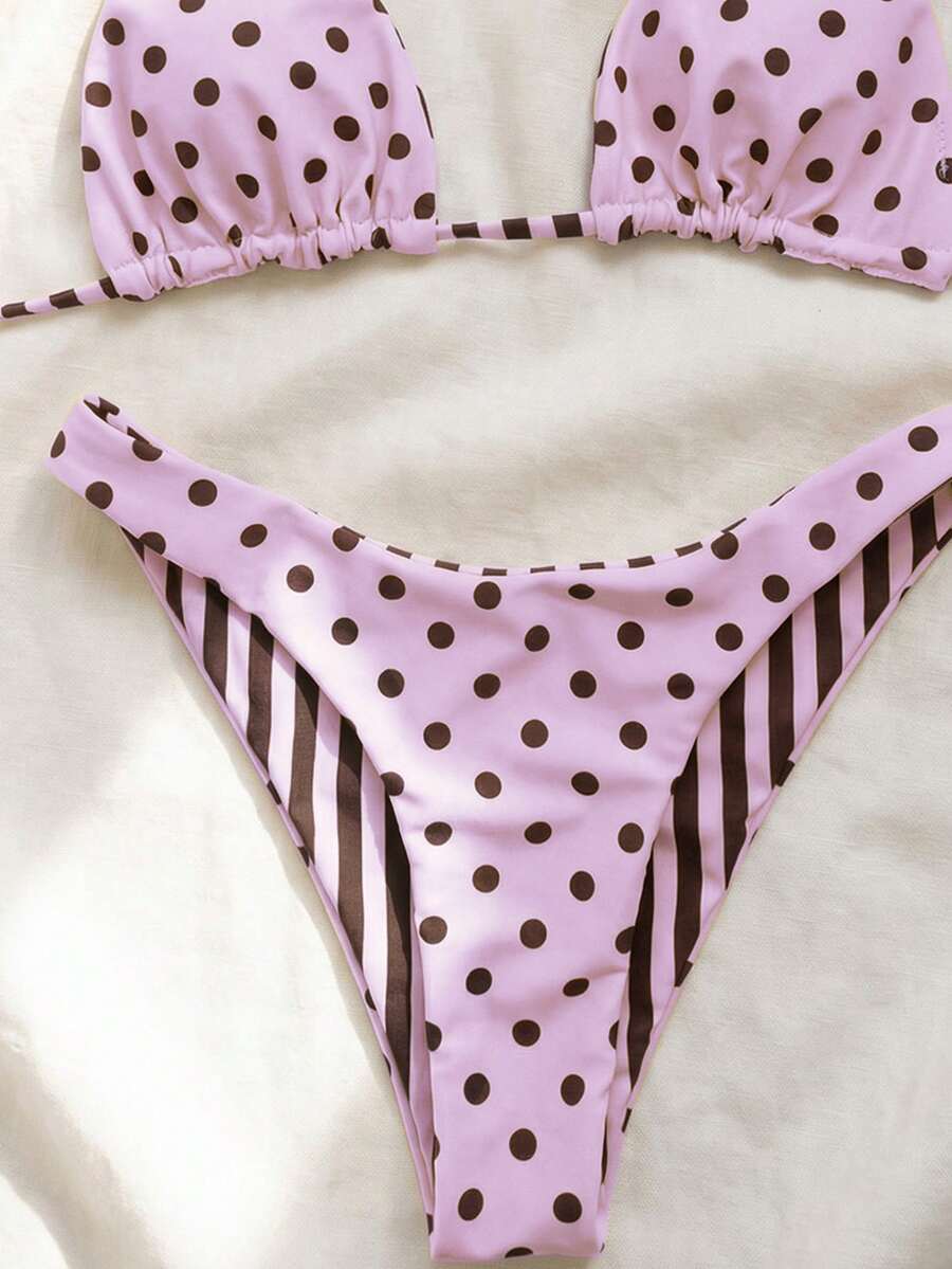 Women's two-piece halter bikini set featuring high cut thong bottoms and removable padding