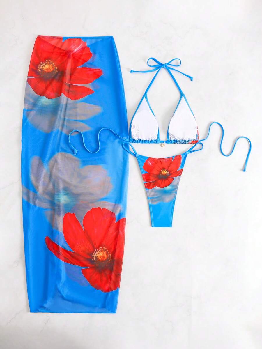 Women's 3-piece floral swimsuit set featuring a multicolor tie-back halter bikini top, low-waist bottoms, and a matching sheer mesh maxi skirt.