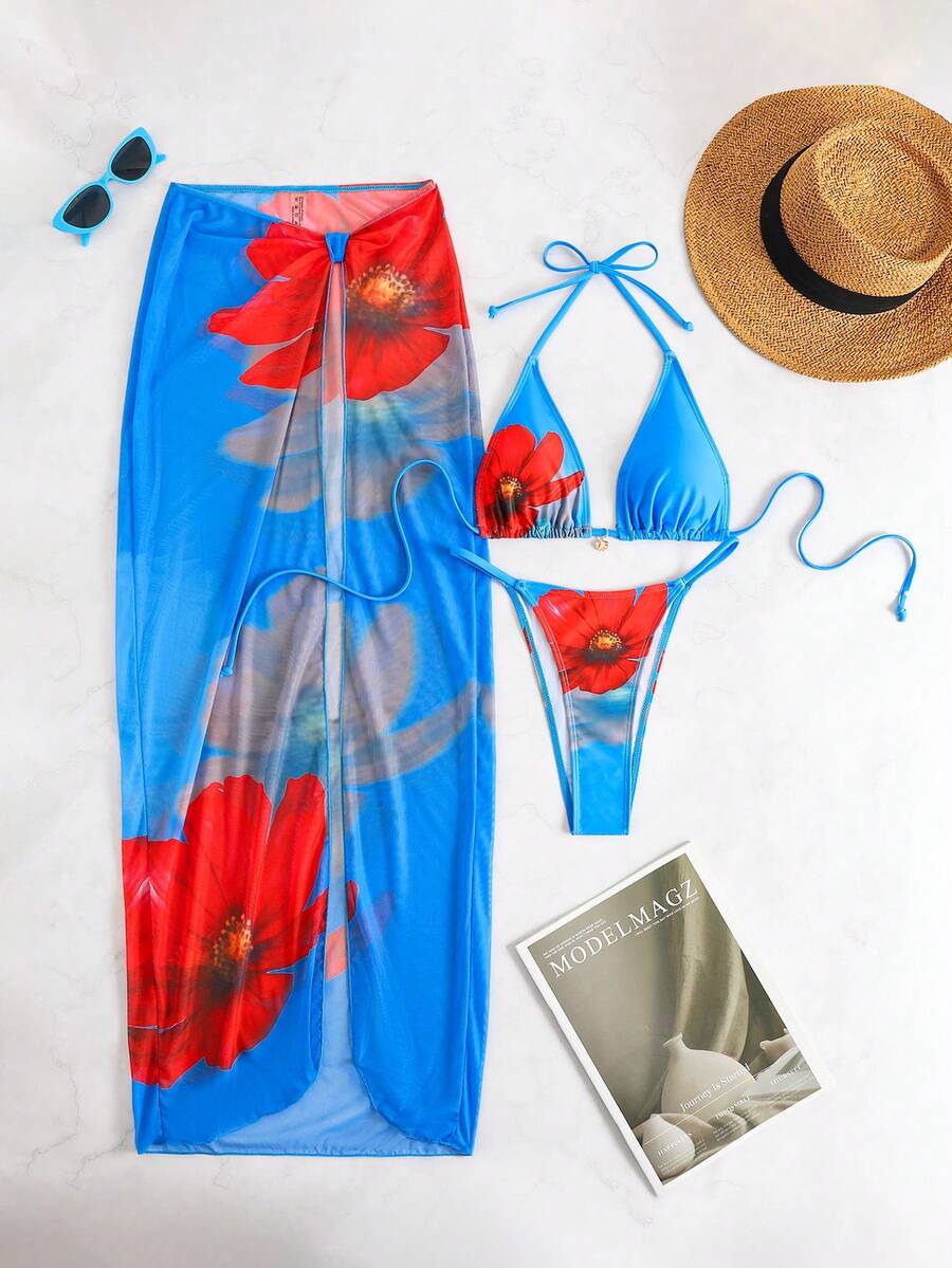 Women's 3-piece floral swimsuit set featuring a multicolor tie-back halter bikini top, low-waist bottoms, and a matching sheer mesh maxi skirt.