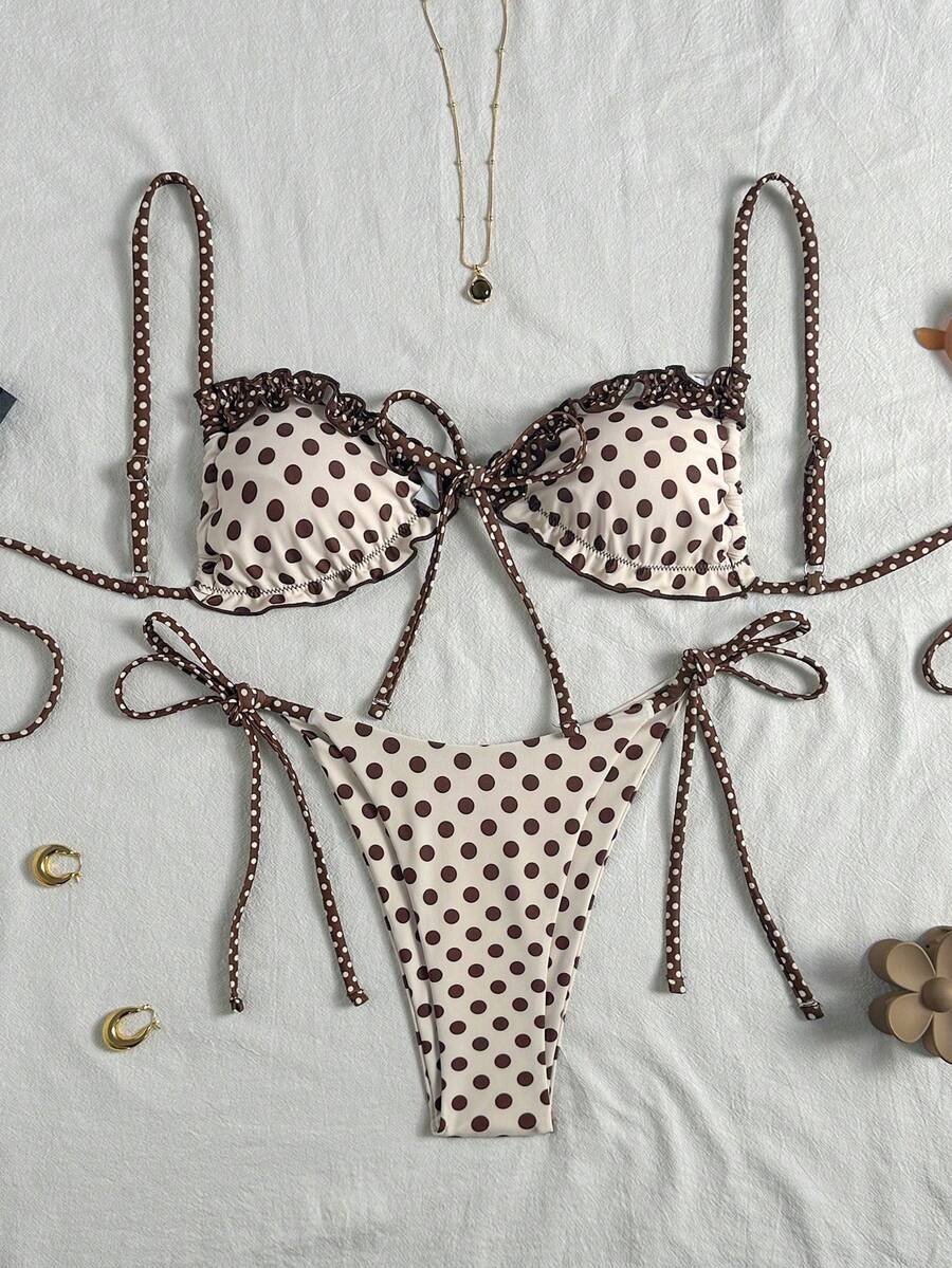 Women's beige two-piece bikini set featuring a wireless top with removable padding, spaghetti straps, tie back detail, and low waist hipster swimsuit bottoms.