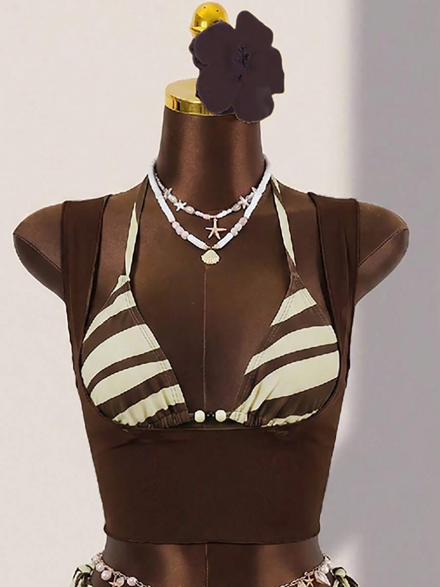Brown striped 3-piece bikini set for women featuring a halter tie neck, wireless triangle cups with removable padding, cut-out details, and low waist tie side bottoms.