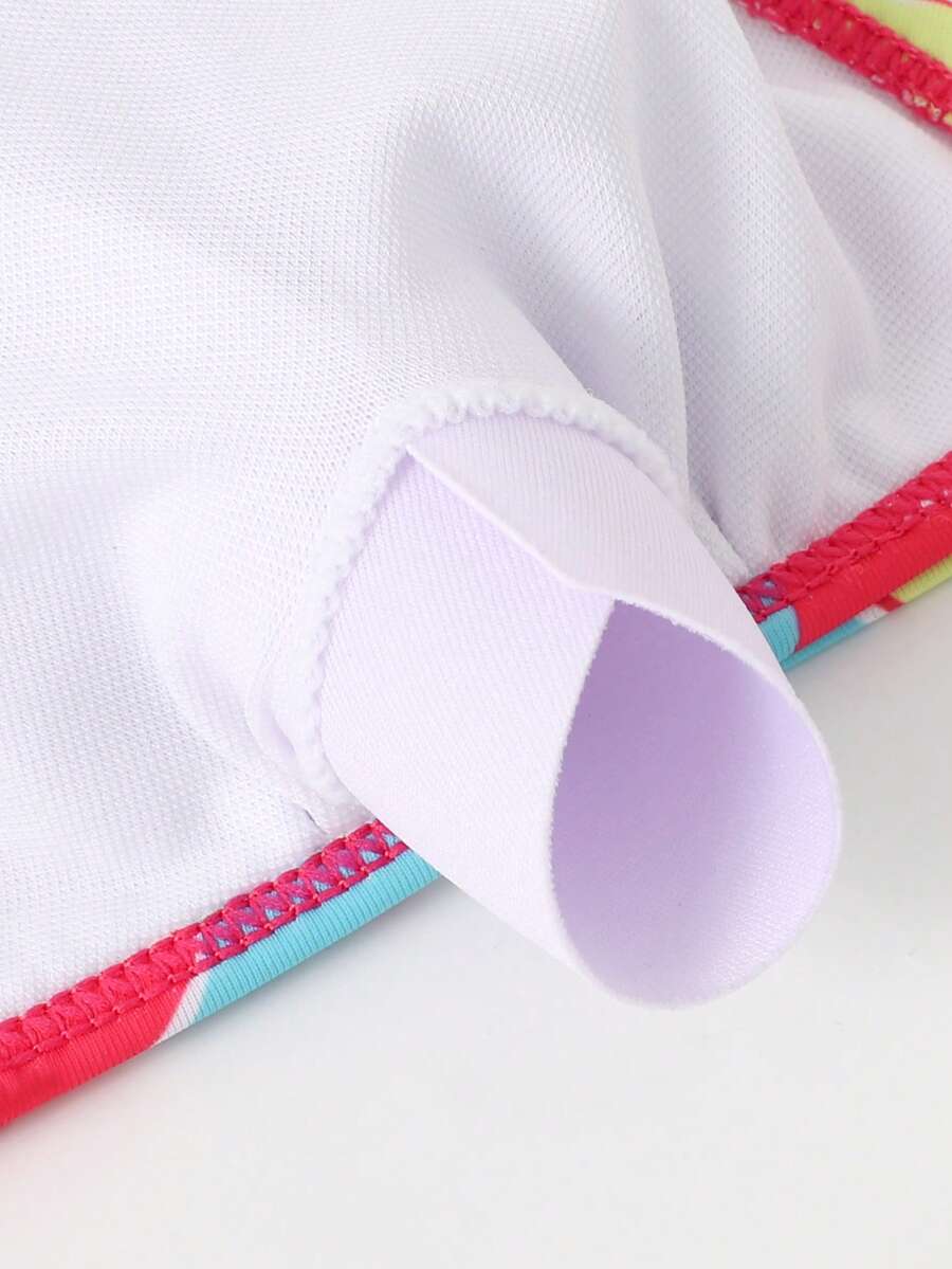 Tween girls multicolor striped 2-piece bikini set with spaghetti strap top, twist detail, and short high-waist or mid-waist swim bottoms for beach and pool wear.