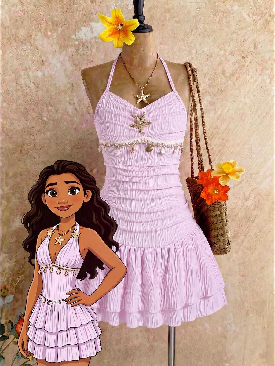Tween girls apricot sleeveless halter mini dress with textured starfish and shell decor, shirred tiered layer, high waist, and flounce hem.