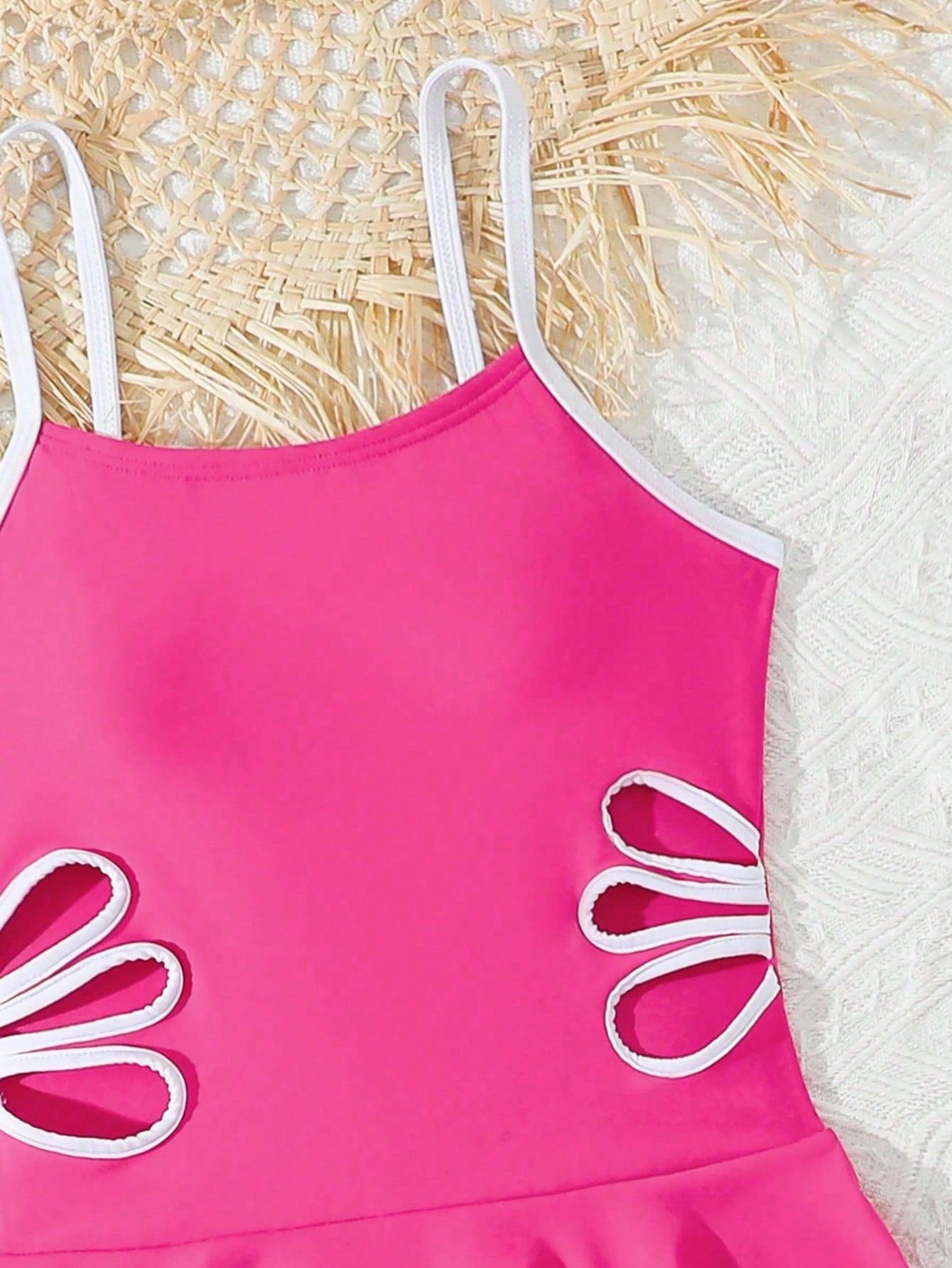 Tween girls black two-piece tankini swimwear set featuring a spaghetti strap sleeveless top with cutout detail and contrast piping, paired with short swim shorts.
