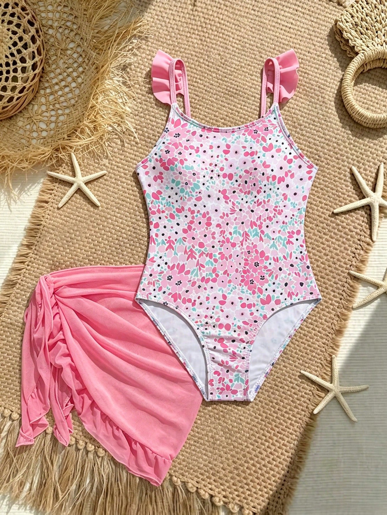 Tween girls one-piece swimsuit in leopard print with ruffle shoulder straps, scoop neckline, fitted shape, and attached ruffle hem skirt; sleeveless, mid-waist skirt bottom, and lined body for swimming, vacation, and summer beach wear.