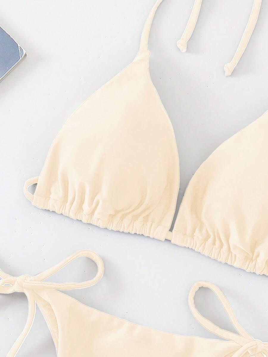 Apricot plain halter triangle bikini swimwear set with tie back top and low waist tie side thong bottom for women