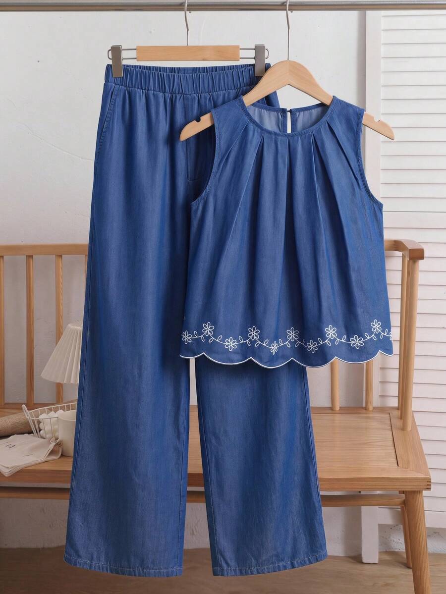 Tween girls casual apricot striped sleeveless top with round neck and ruffle hem paired with matching straight leg pants.