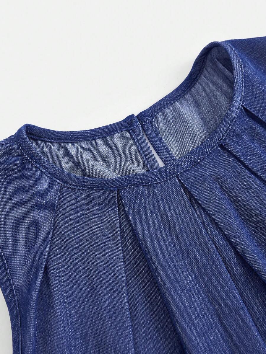 Tween girls casual apricot striped sleeveless top with round neck and ruffle hem paired with matching straight leg pants.