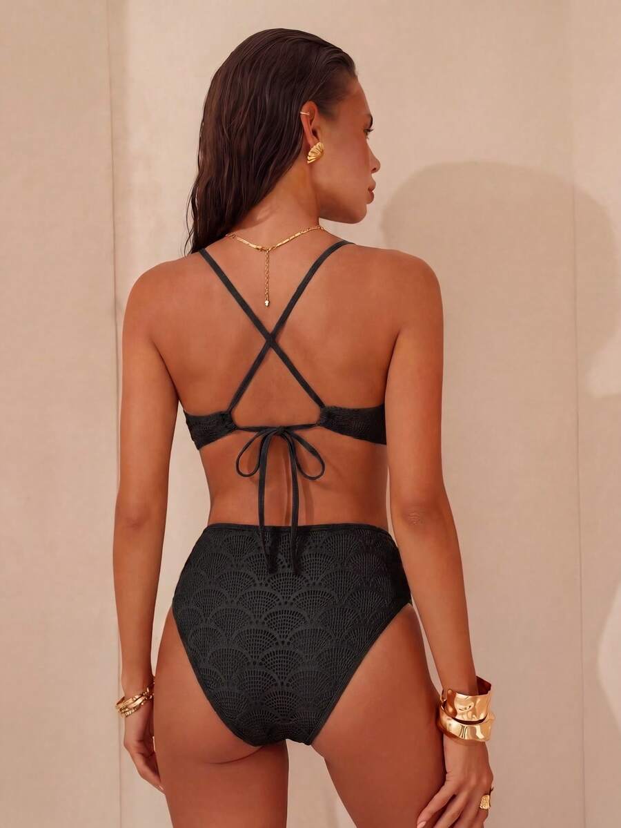 Women's fresh green boho one-piece swimsuit featuring a lace-up V-neckline, textured stretch fabric, and sleeveless design for beach and vacation wear.