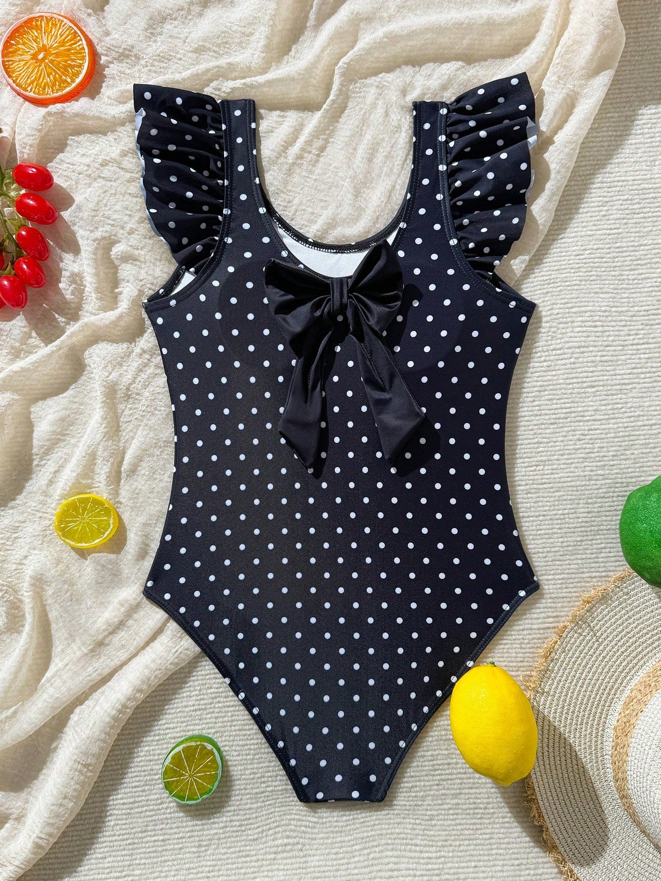 White tween girls one-piece swimsuit with V-neck, cutout detail, appliques, plant pattern, mid-waist bottom, and lined body for beach or swimming