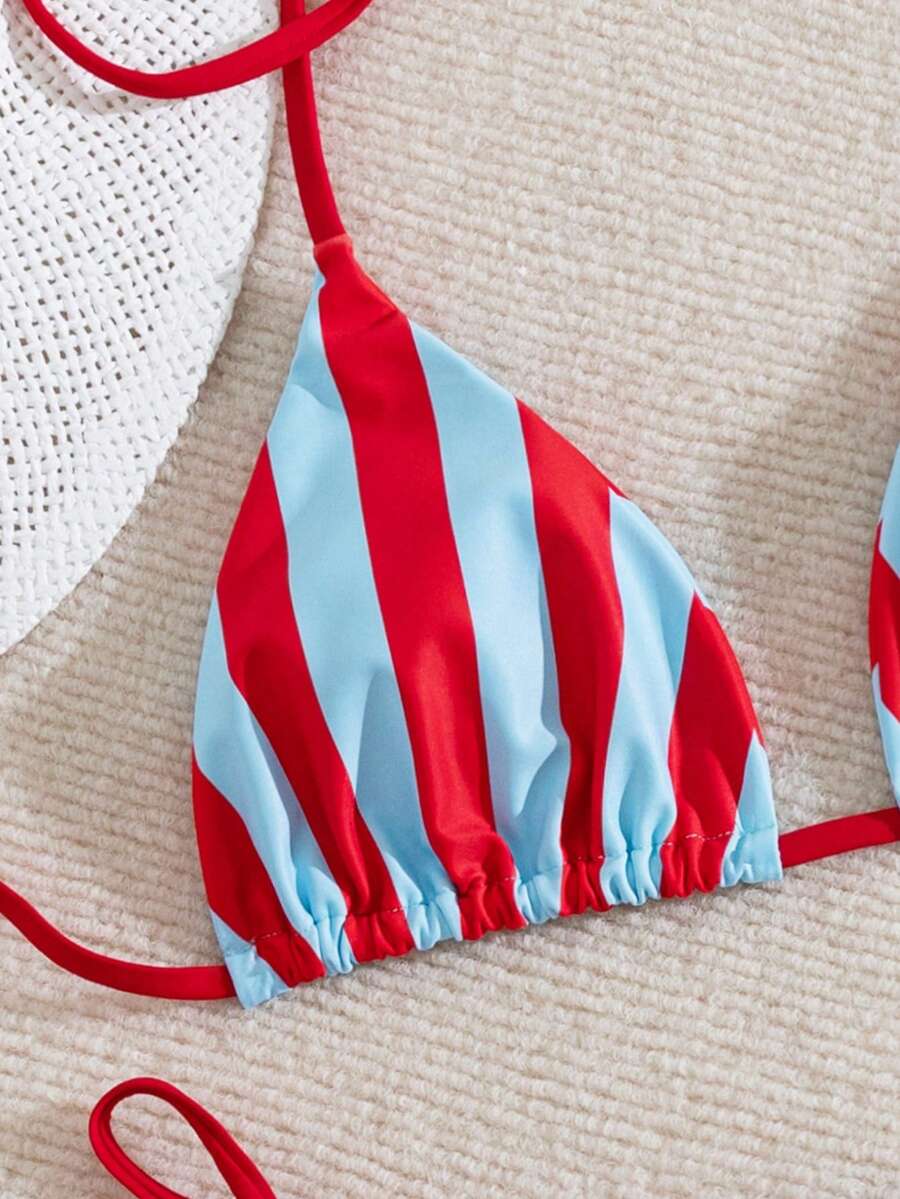Multicolor striped halter neck two-piece bikini set featuring wireless triangle cups and low-waist tie-side bottoms.