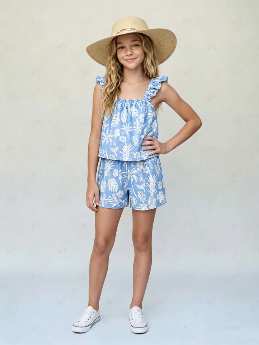 Tween girl wearing a blue and white striped sleeveless top featuring embroidery details and ruffle trim with matching shorts.