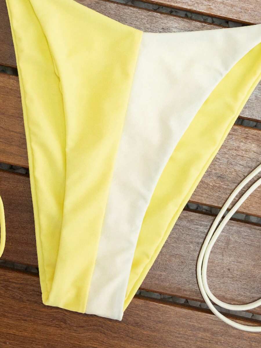 Women's triangle bikini set with contrast lace wireless bra top and ultra high waist tie side bottoms.
