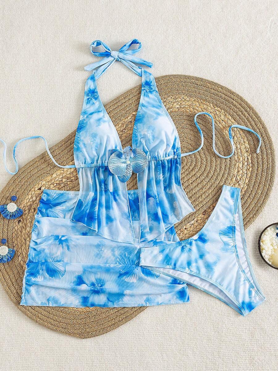 Women's 3-piece floral bikini set featuring a multicolor plant print halter top with 3D rose detail, matching bikini bottoms, and short skirt cover-up