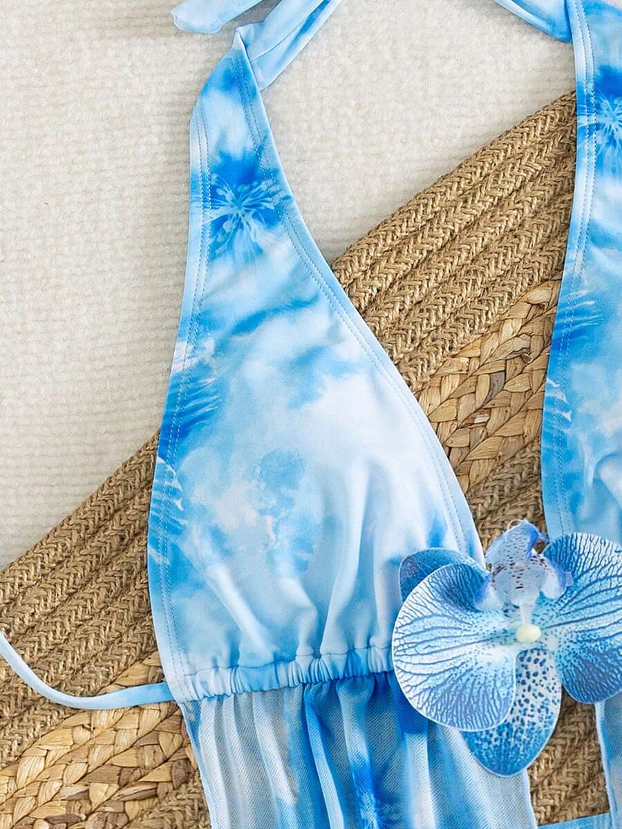 Women's 3-piece floral bikini set featuring a multicolor plant print halter top with 3D rose detail, matching bikini bottoms, and short skirt cover-up