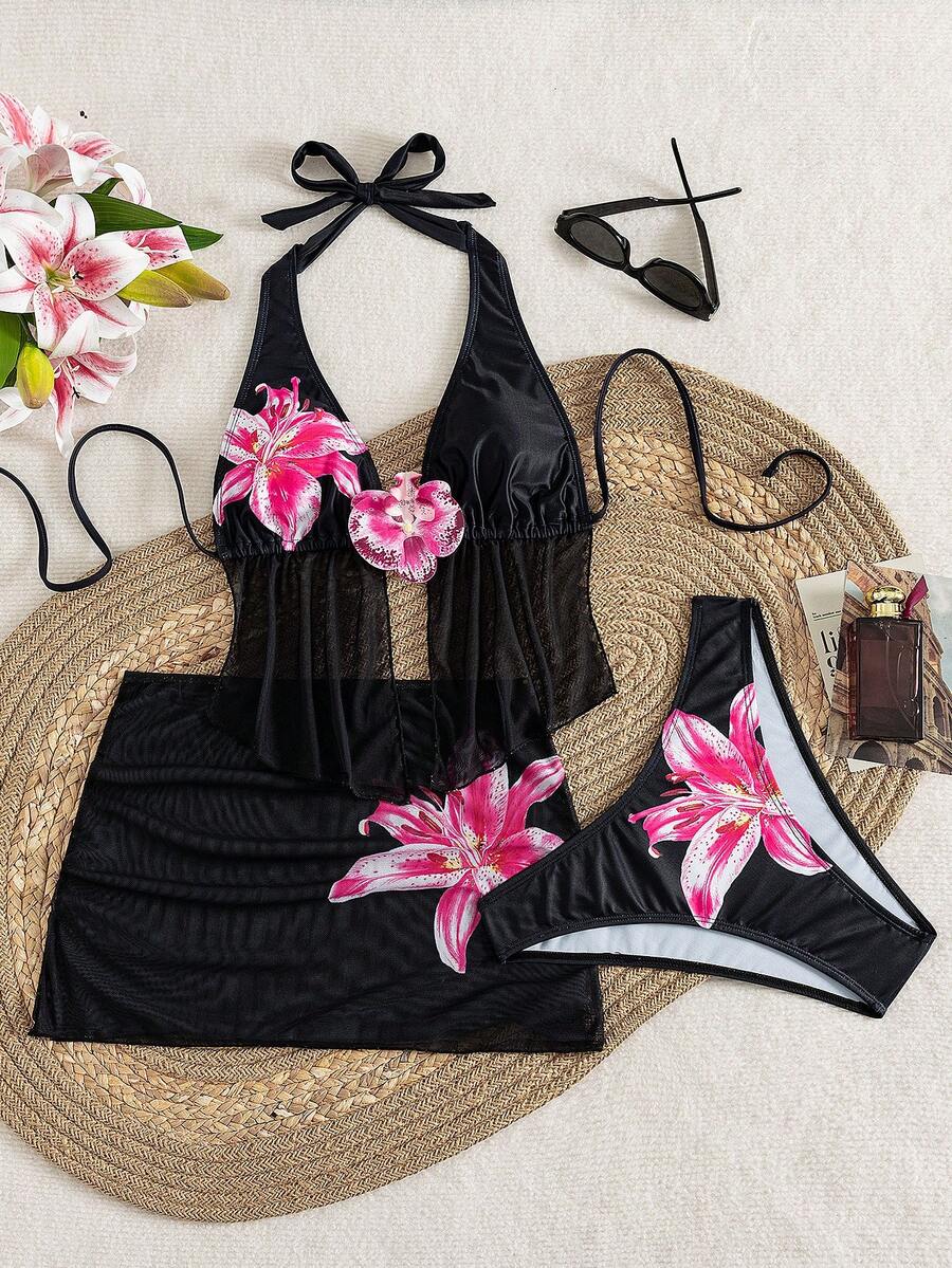 Women's 3-piece floral bikini set featuring a multicolor plant print halter top with 3D rose detail, matching bikini bottoms, and short skirt cover-up