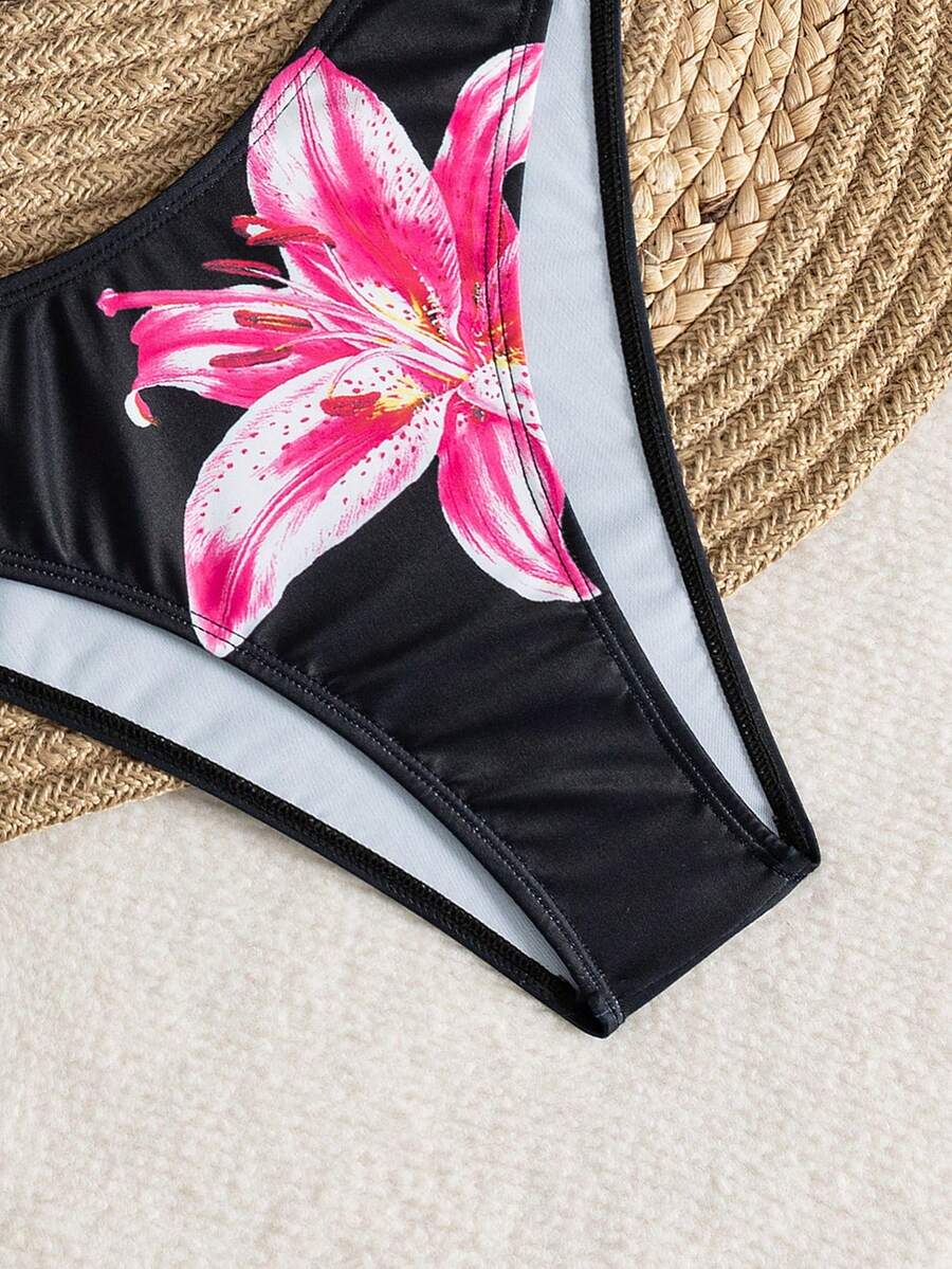 Women's 3-piece floral bikini set featuring a multicolor plant print halter top with 3D rose detail, matching bikini bottoms, and short skirt cover-up
