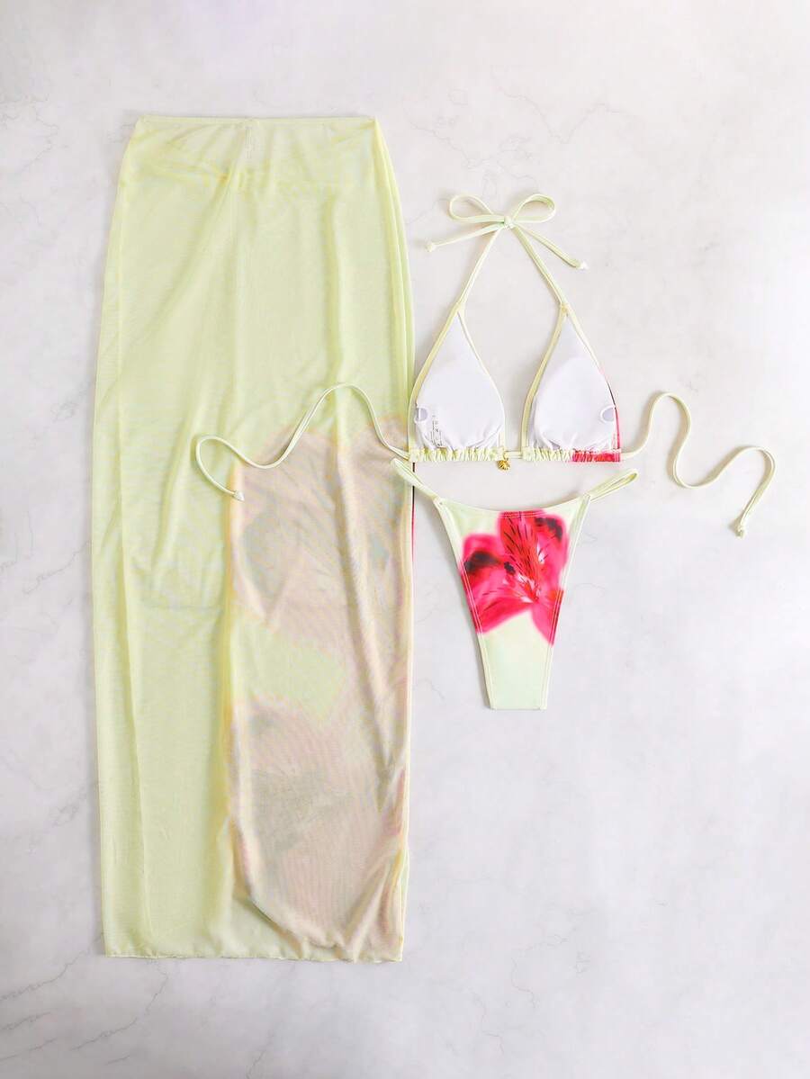 Women's 3-piece floral swimsuit set featuring a multicolor tie-back halter bikini top, low-waist bottoms, and a matching sheer mesh maxi skirt.