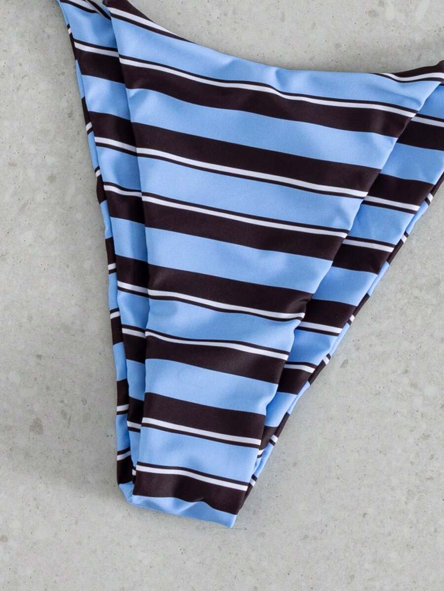 Multicolor bohemian bikini set for women featuring a backless halter top with knot details and high cut swimsuit bottoms.