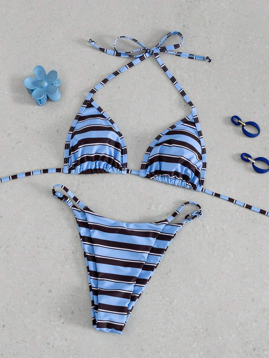 Multicolor bohemian bikini set for women featuring a backless halter top with knot details and high cut swimsuit bottoms.