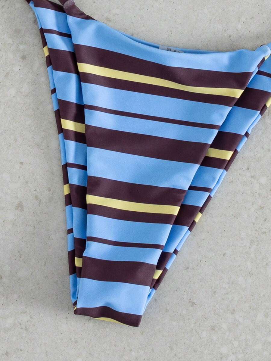 Multicolor bohemian bikini set for women featuring a backless halter top with knot details and high cut swimsuit bottoms.
