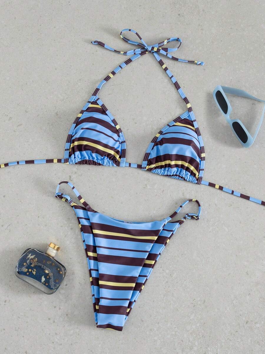 Multicolor bohemian bikini set for women featuring a backless halter top with knot details and high cut swimsuit bottoms.