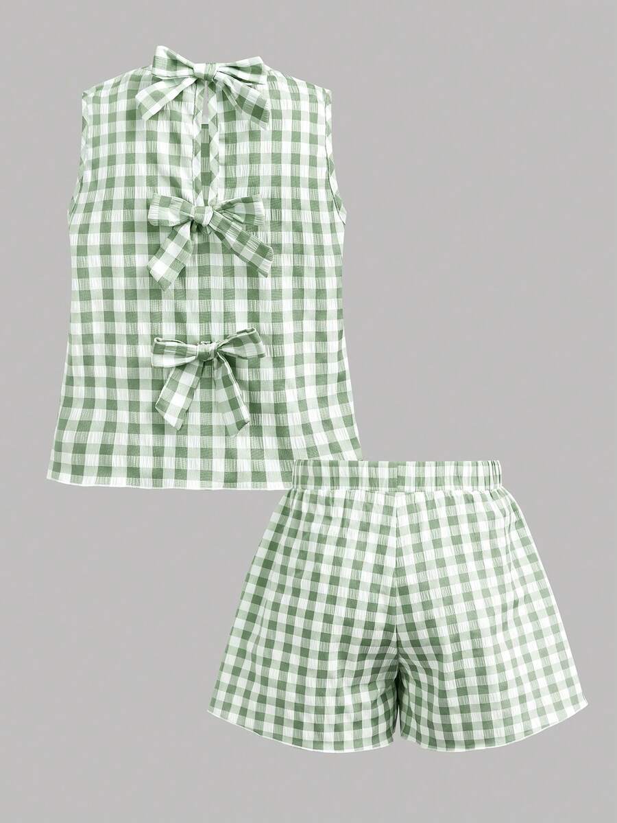 Tween girls casual blue tank top featuring round neck, textured fabric, and bow detail paired with matching shorts set.