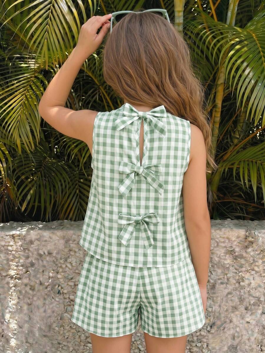 Tween girls casual blue tank top featuring round neck, textured fabric, and bow detail paired with matching shorts set.