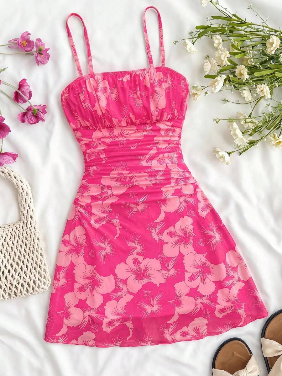 Yellow sleeveless tween girls cami dress with spaghetti straps, ruched bust, shirred details, high waist, and flared short A-line hem for vacation wear.