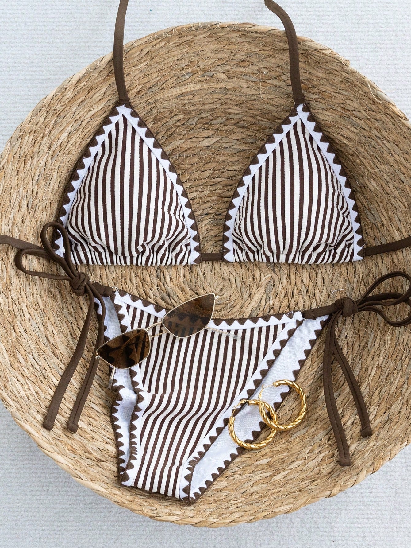 Women's triangle bikini set with contrast lace wireless bra top and ultra high waist tie side bottoms.