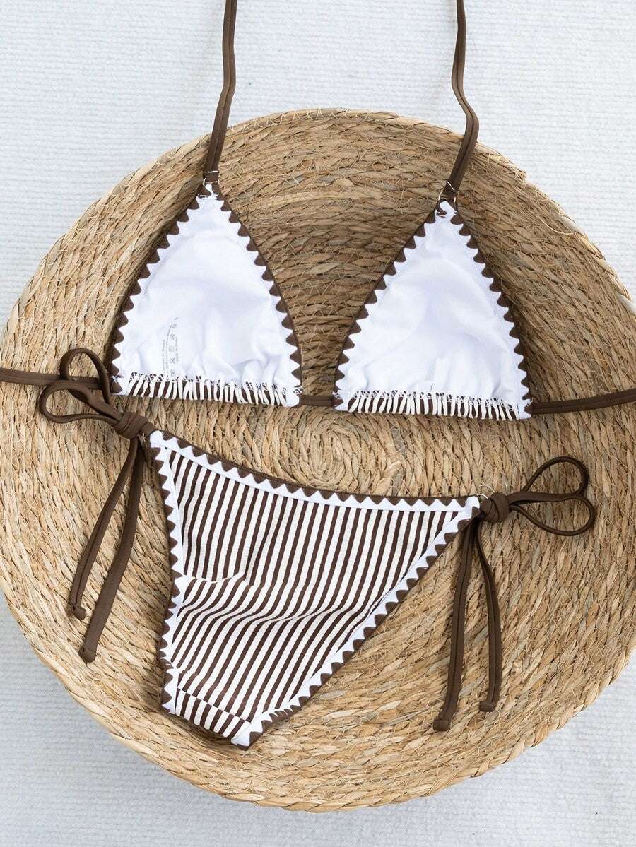 Women's triangle bikini set with contrast lace wireless bra top and ultra high waist tie side bottoms.