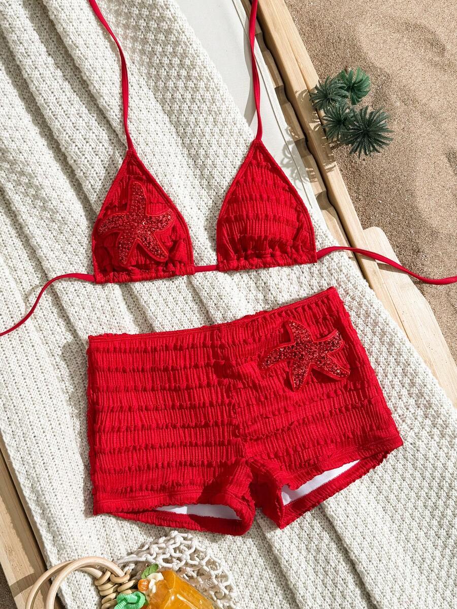 Women's apricot two-piece swimsuit set with a halter tie-back top and matching high stretch shorts.