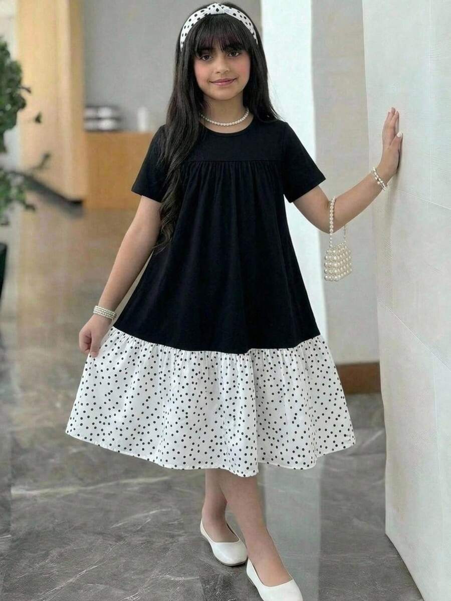 Tween girls casual black and white striped short sleeve smock dress with round neck and flounce hem