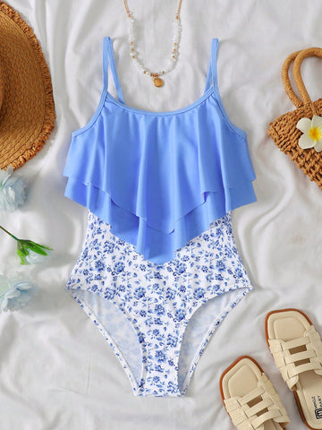 NEWSHEIN tween girls fitted one-piece swimsuit in blue and white plant pattern with ruffle tiered detail, spaghetti straps, and lined body for beach or resort wear