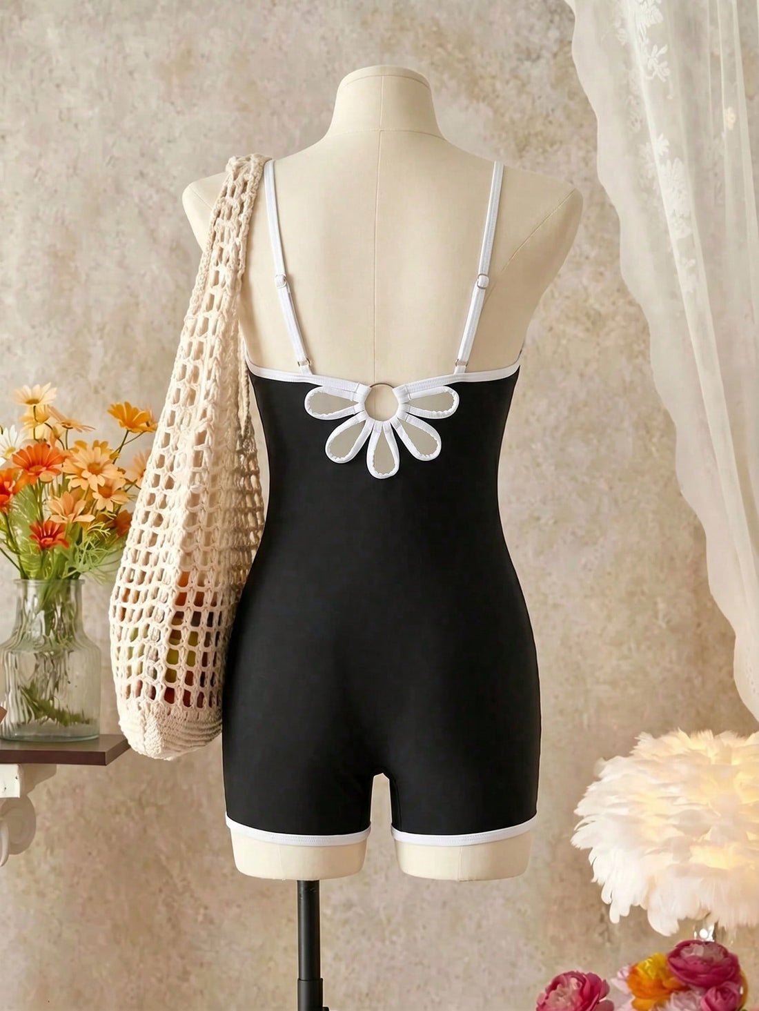 Tween girls colorblock camisole romper swimsuit with spaghetti straps, appliques, all-over print, fitted short silhouette, and medium-stretch fabric for beach, pool, and vacation wear.