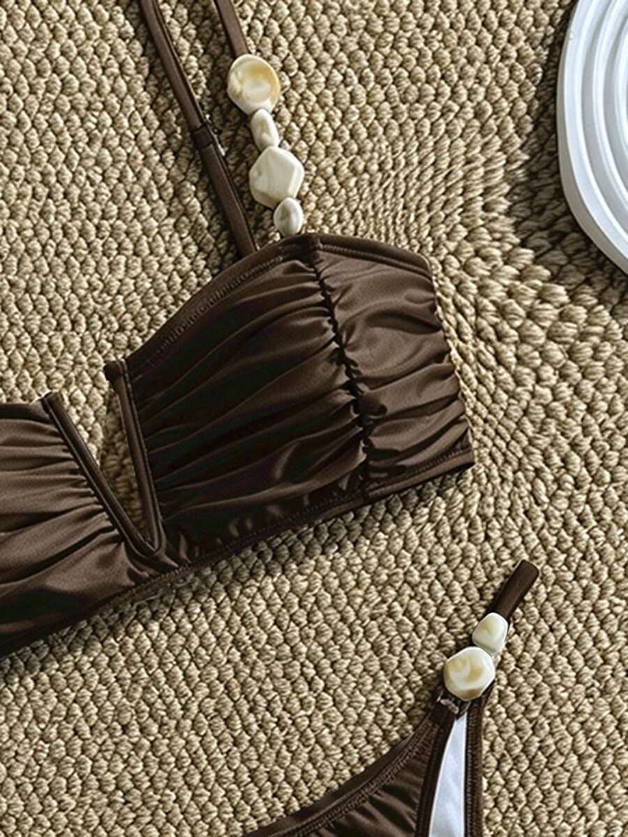 Apricot high waist two-piece bikini set for women featuring V-wired bandeau top with shell decor and high stretch swimwear fabric.