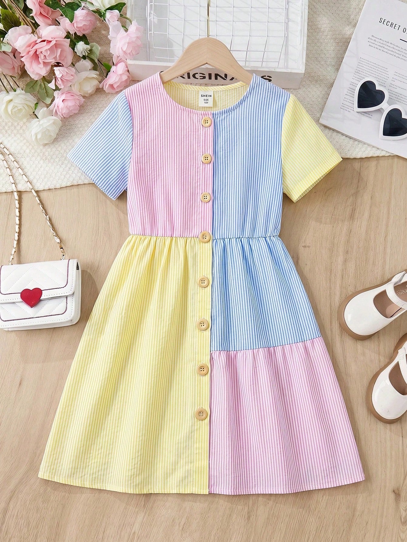 Tween girls casual colorblock short sleeve dress featuring a round neck, high waist flared hem, and button-front details.