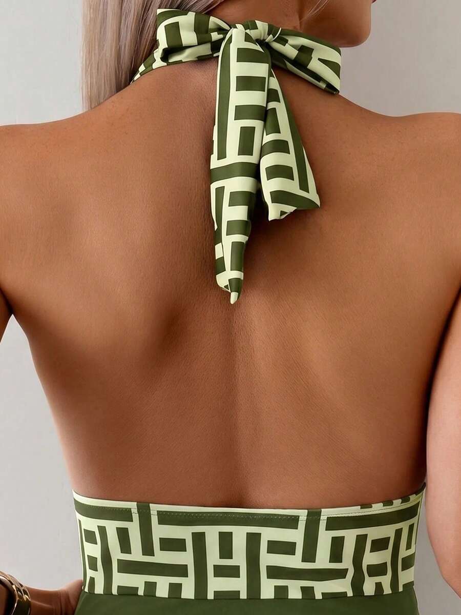 Apricot women's one-piece swimsuit featuring a halter neckline, backless tie-back detail, and ruched knitted fabric.