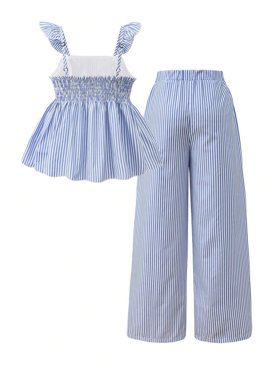 Tween girl wearing an apricot 2-piece outfit set featuring a shirred spaghetti strap short cami top and matching wide-leg long pants.