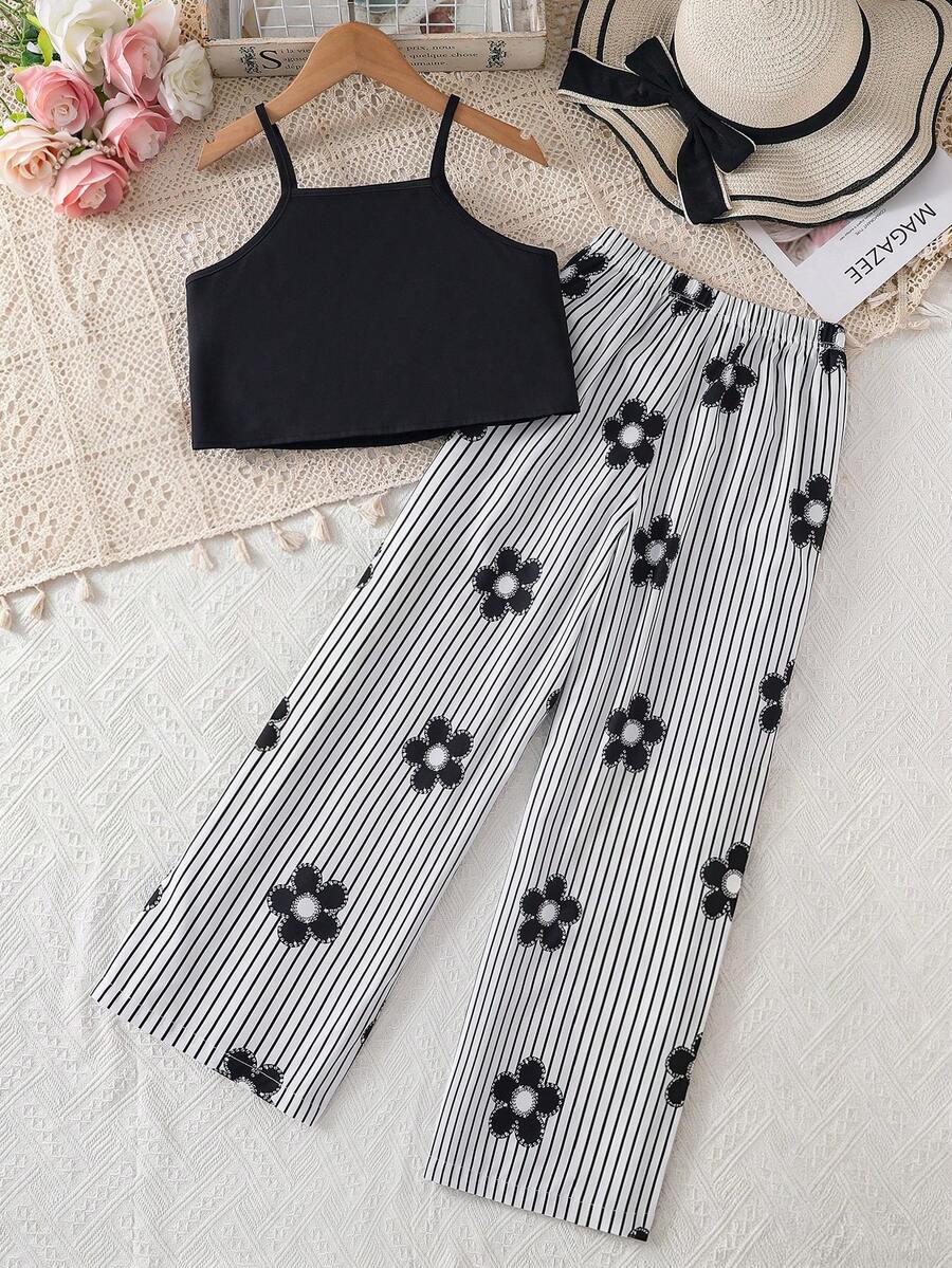 Tween girls blue 2-piece vacation outfit set featuring a tiered ruffle spaghetti strap camisole and loose high-waist pants.