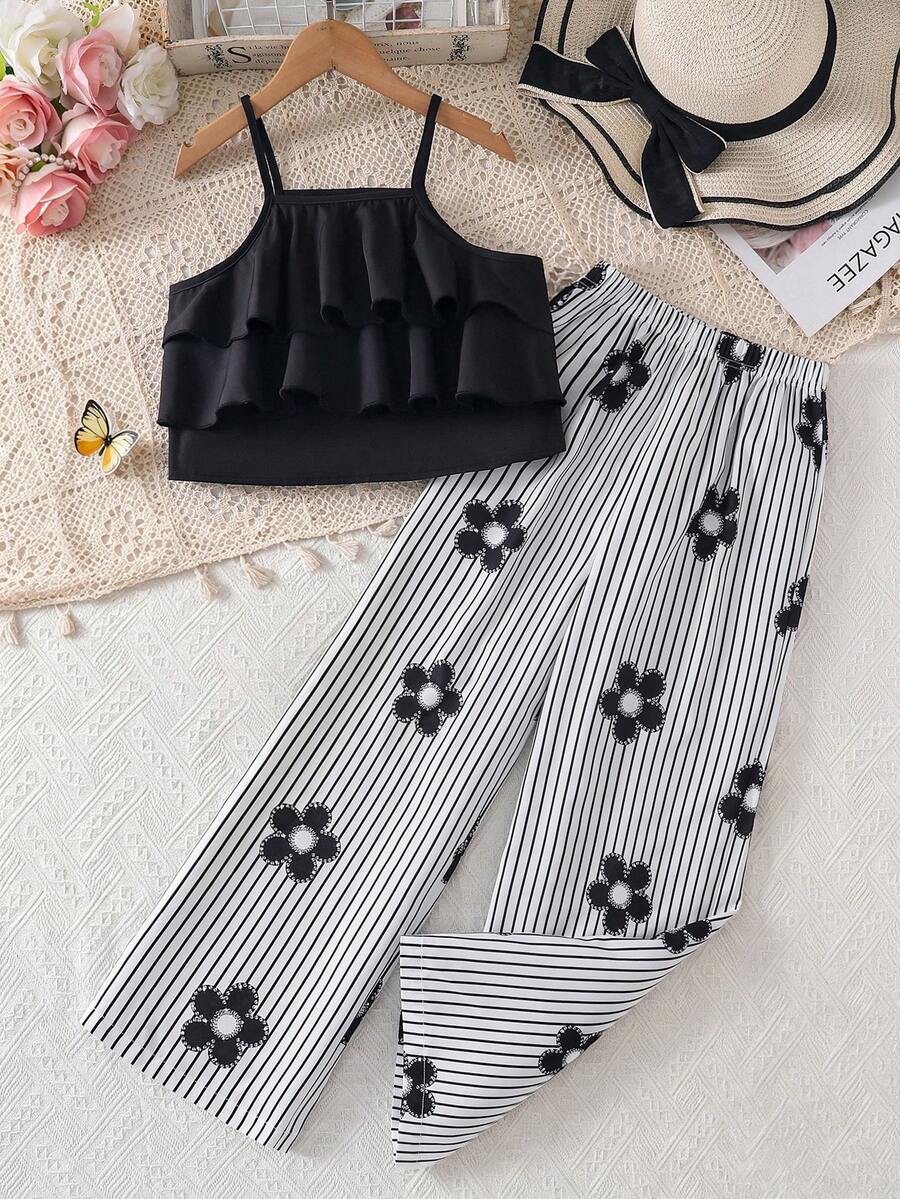 Tween girls blue 2-piece vacation outfit set featuring a tiered ruffle spaghetti strap camisole and loose high-waist pants.