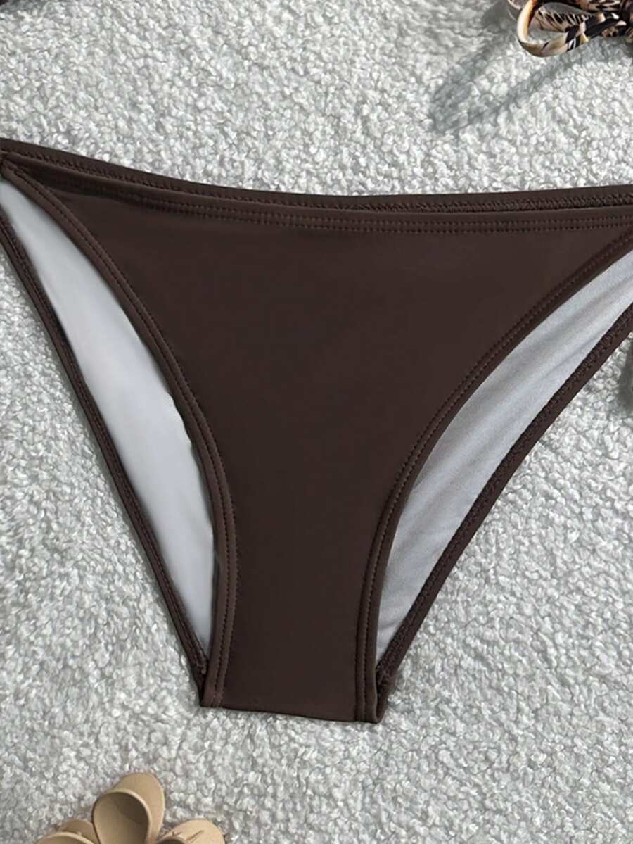 Women's high waist halter tie bikini swimwear set featuring triangle cups, wireless bra with removable padding, and tie side bottoms.