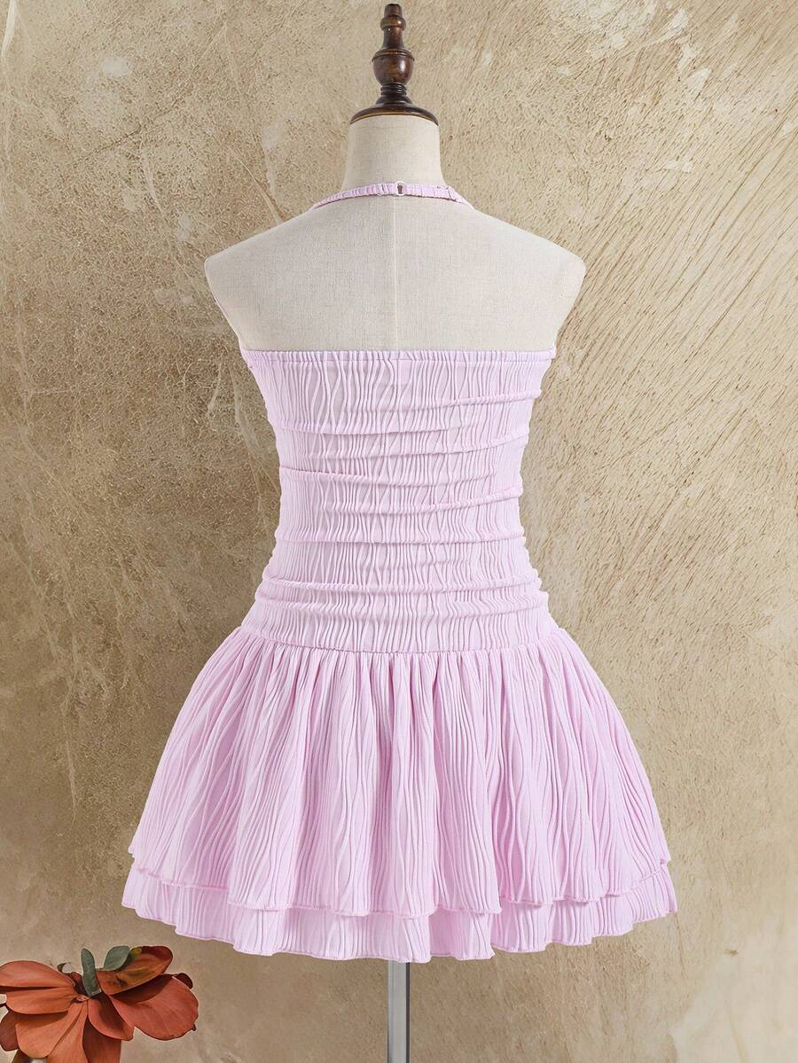 Tween girls apricot sleeveless halter mini dress with textured starfish and shell decor, shirred tiered layer, high waist, and flounce hem.