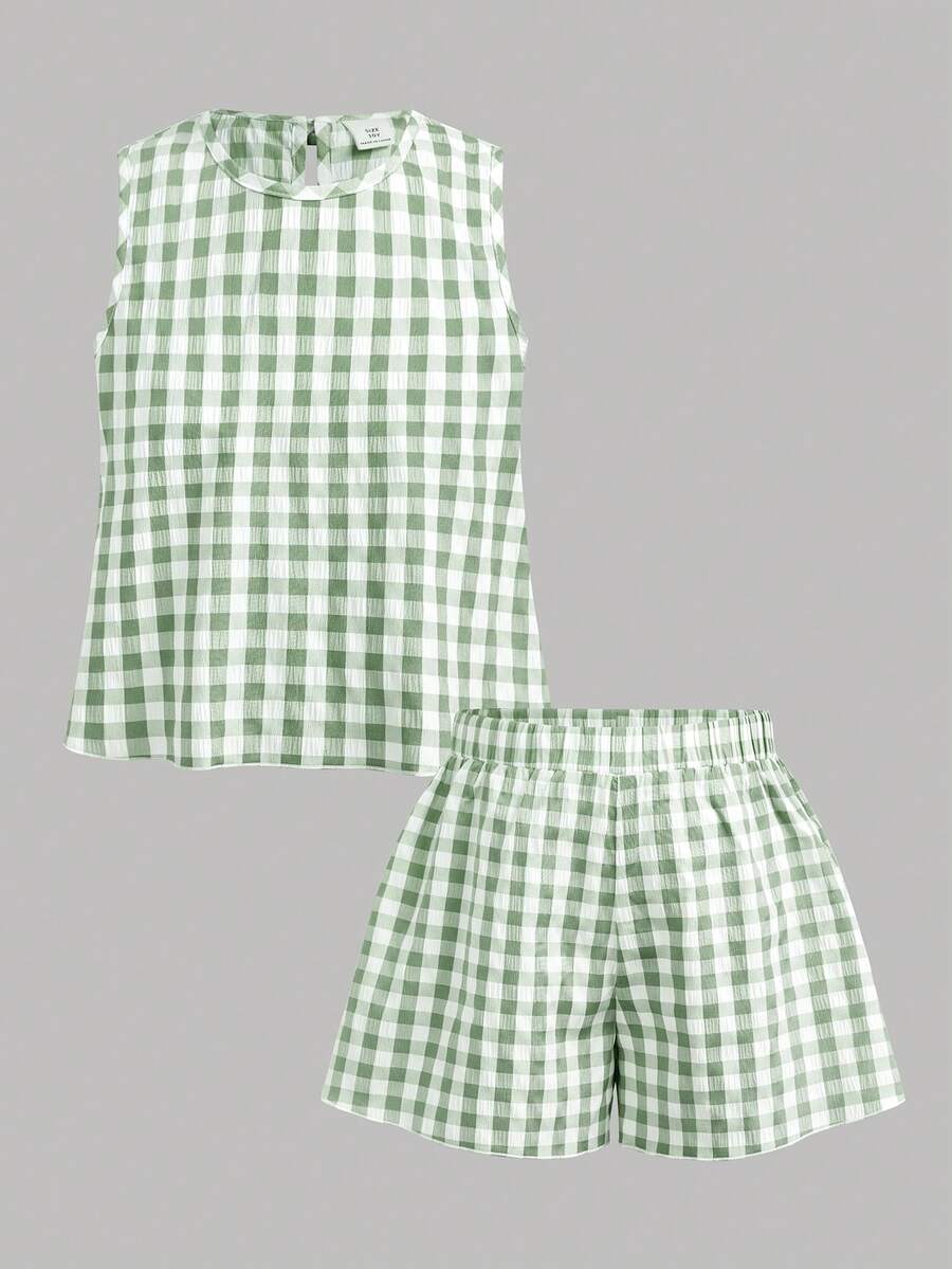 Tween girls casual blue tank top featuring round neck, textured fabric, and bow detail paired with matching shorts set.