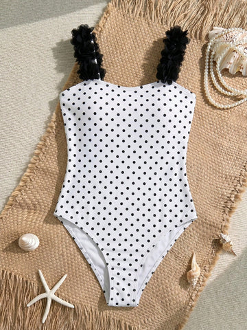 Tween girls one-piece swimsuit with 3D floral applique details, plant graphics, scoop neck, fitted shape, and lined body for beach and vacation wear.