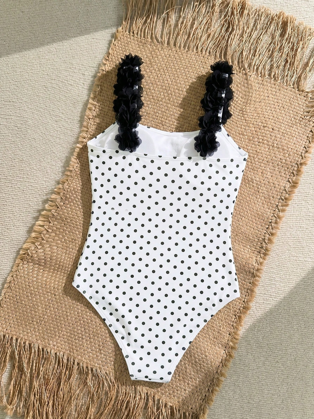 Tween girls one-piece swimsuit with 3D floral applique details, plant graphics, scoop neck, fitted shape, and lined body for beach and vacation wear.